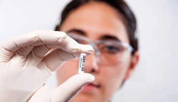 Scientist Inspecting Slide