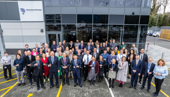 Group photo of OGT employees at the opening of the new office in Oxford